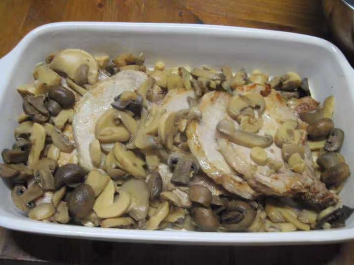 Gratin de cotelettes de porc et champignons