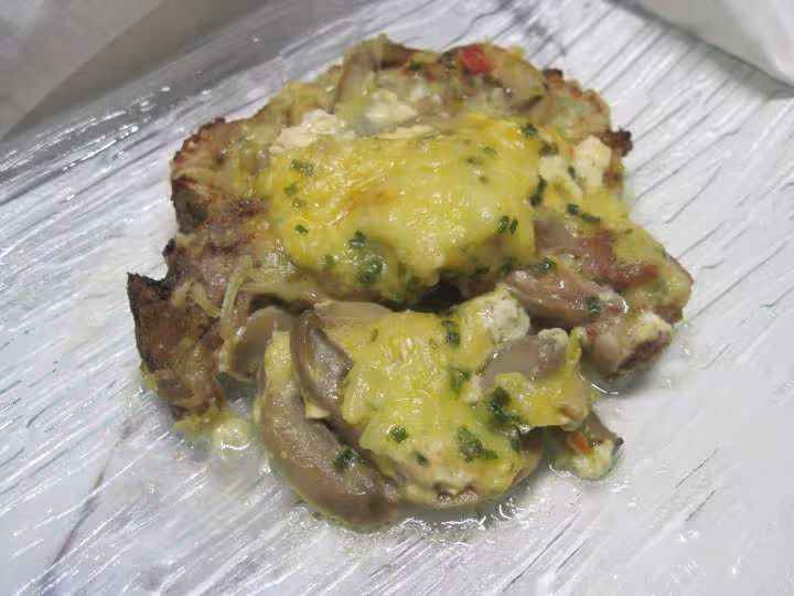 Gratin de cotelettes de porc et champignons
