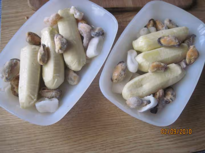 Gratin de quenelles de brochet et fruits mer en sauce