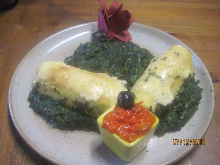 Grosses quenelles au poisson au epinard
