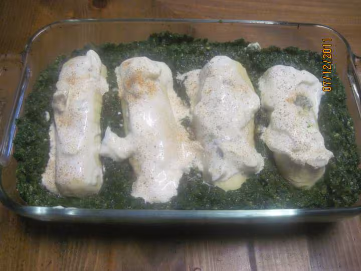 Grosses quenelles au poisson au epinard