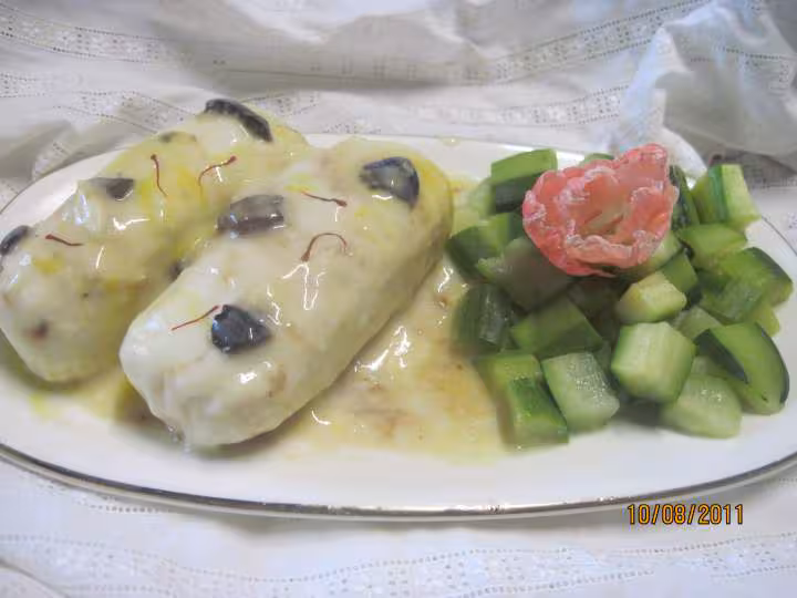 Grosses quenelles de brochet aux des de courgettes