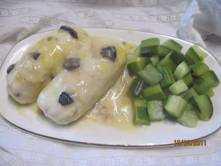 Grosses quenelles de brochet aux des de courgettes