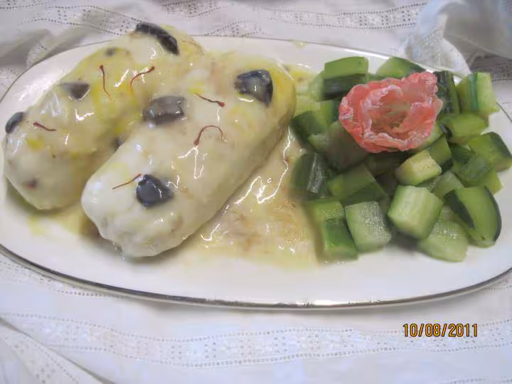 Grosses quenelles de brochet aux des de courgettes