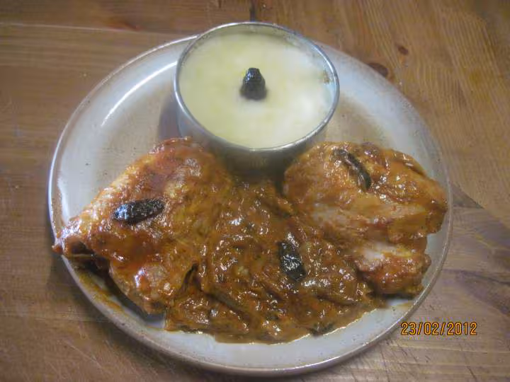 Hauts de poulets sauce tomate cuisinee