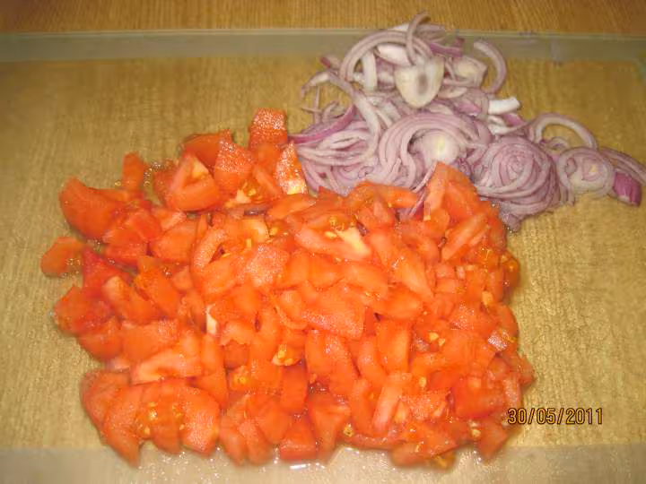 Lamelles de poulet aux pate de savoie en sauce tomate