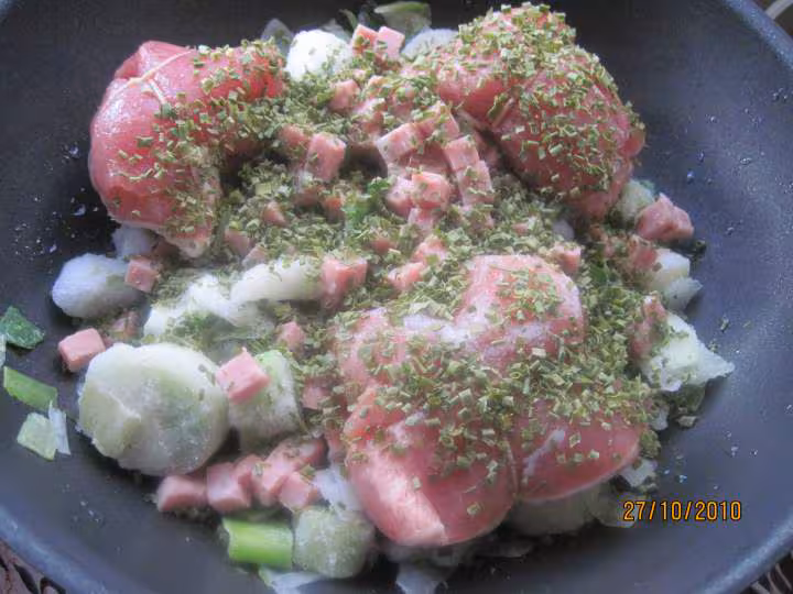 Paupiettes de porc cuites sur un lit de oireaux