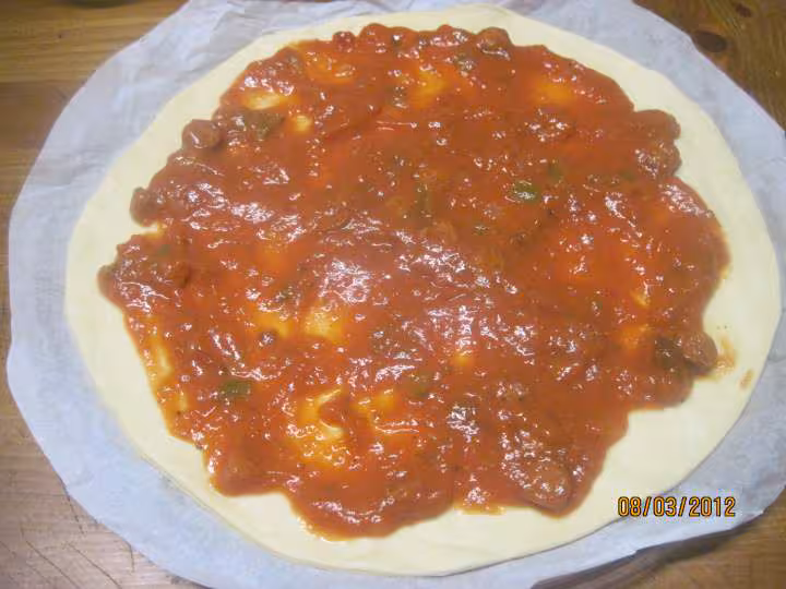 Pizza au jambon oignons au fromage de chevre