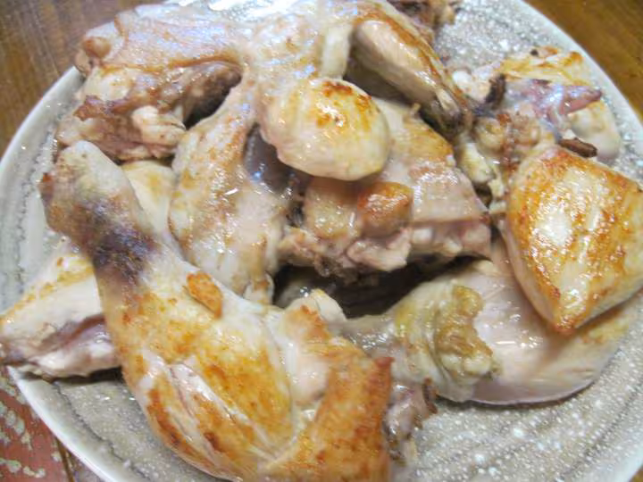Poulet aux petits oignons blancs nouveaux