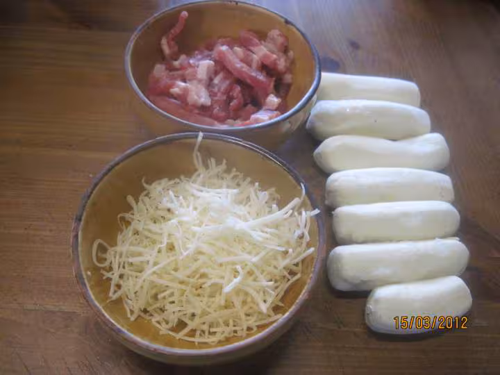 Quenelles nature aux lardons fumes gratines