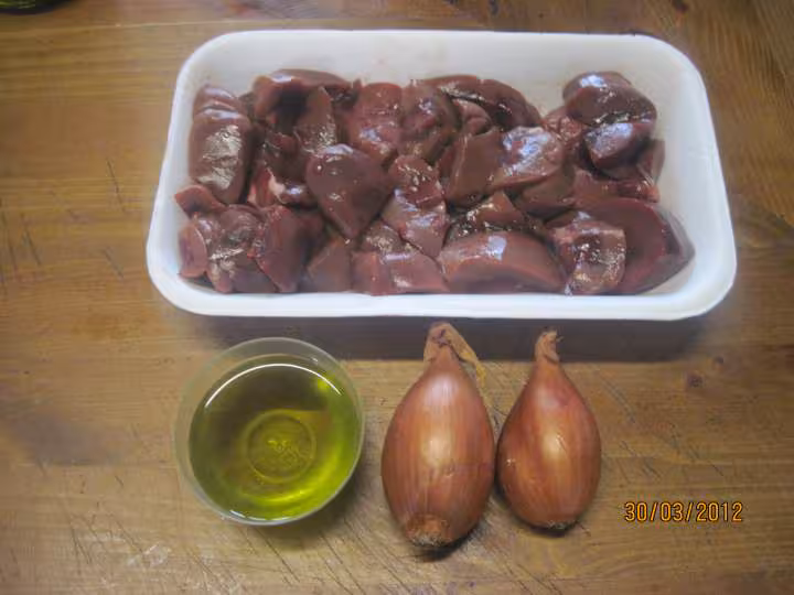 Rognons de porc aux champignons en sauce tomates cuisinee