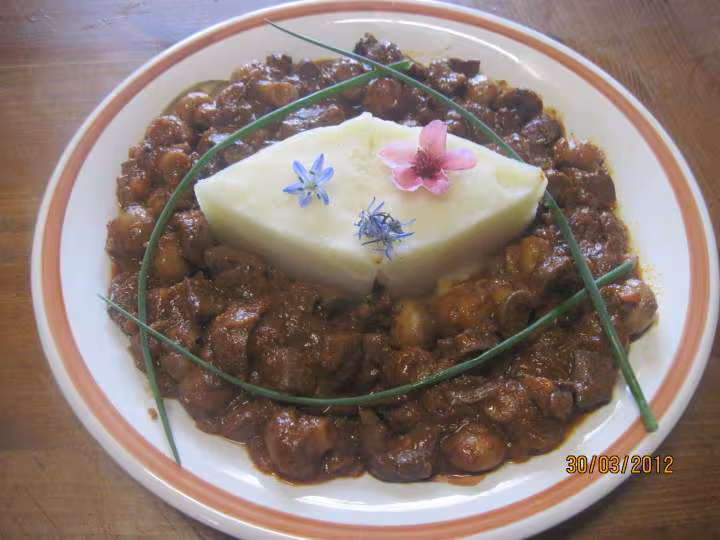 Rognons de porc aux champignons en sauce tomates cuisinee