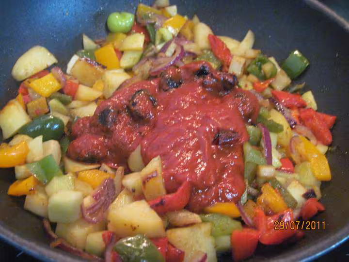 Saucisses de porc aux legumes varies
