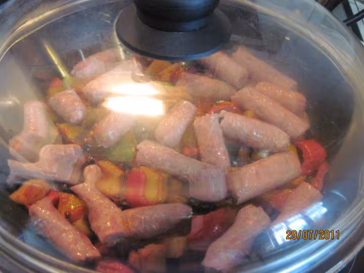 Saucisses de porc aux legumes varies