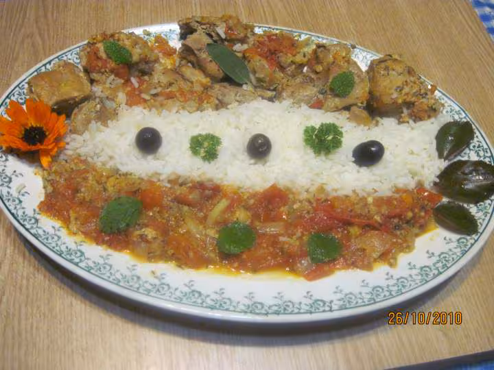 Saute de porc au riz en sauce tomates au vin