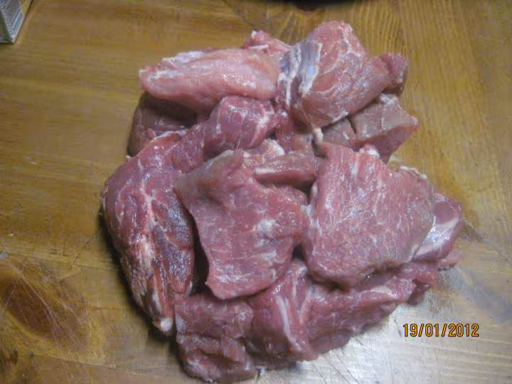 Saute de porc au trio de poivrons en sauce de vin