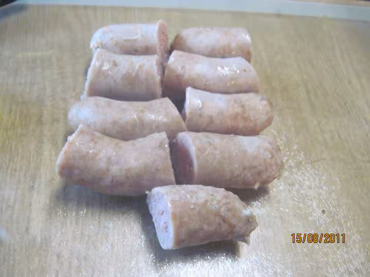 Sautees de courgettes blanches aux saucisses
