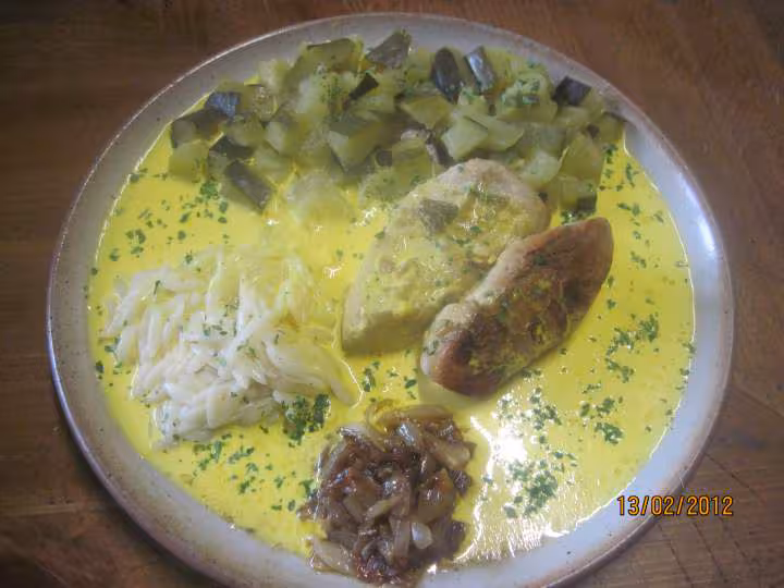 Steaks de dinde garnis a la creme safranee
