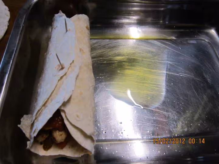 Tortilla aux poivrons et poulet sauce tomate gratinee