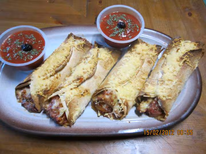 Tortilla aux poivrons et poulet sauce tomate gratinee