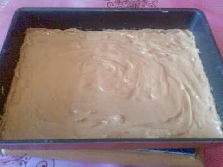 Creme sur le fond de pate carres ecossais