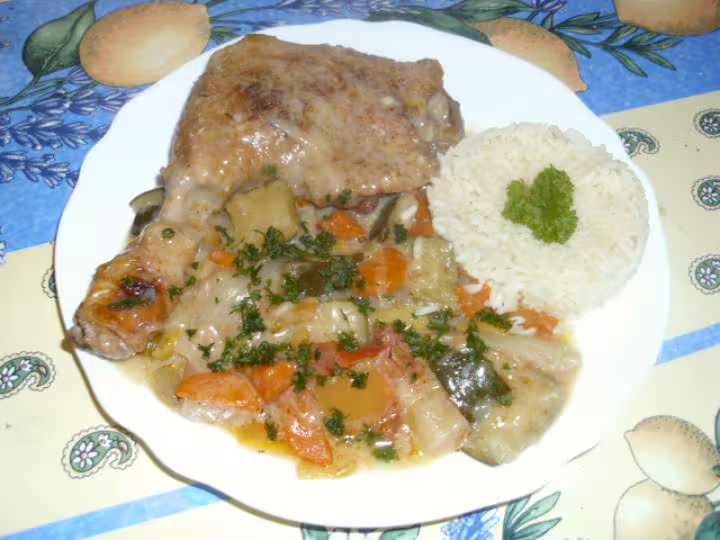 Cuisses de canard et sa fondue de legumes