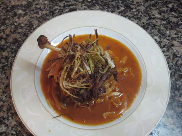 Cuisse de canard confite julienne de poireau a l orange