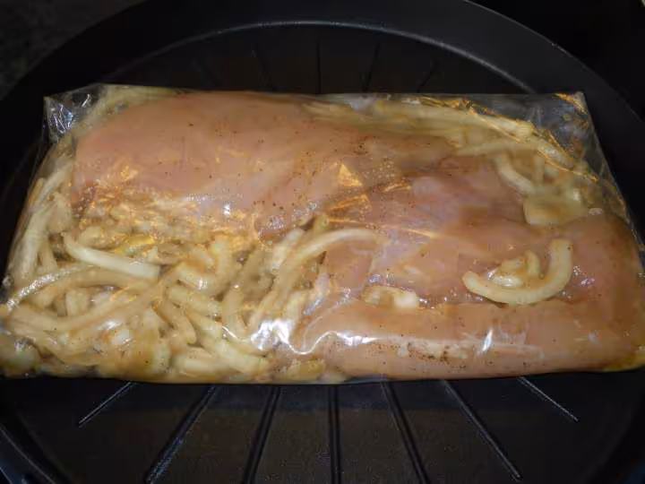 Blancs de poulet aux oignons
