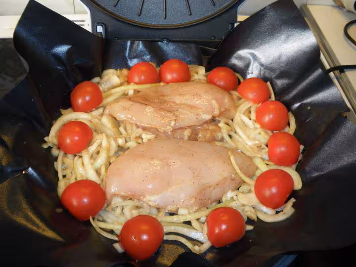 Blancs de poulet aux oignons