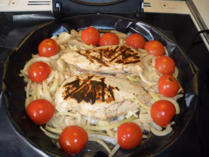 Blancs de poulet aux oignons