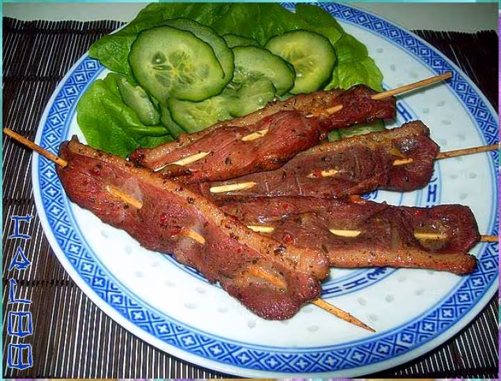 Brochettes de canard marine
