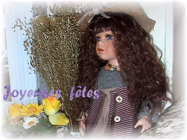 Poupee brune joyeuses fetes