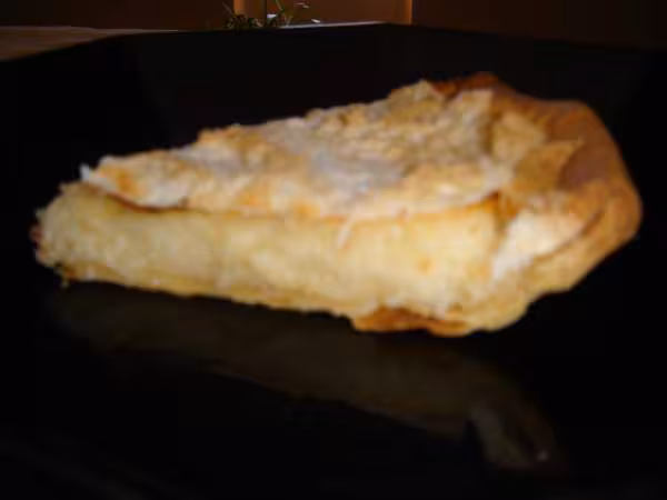 Part de tarte ww a la noix de coco meringuee