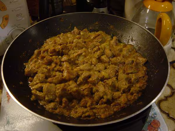 Colombo de porc dans le wok