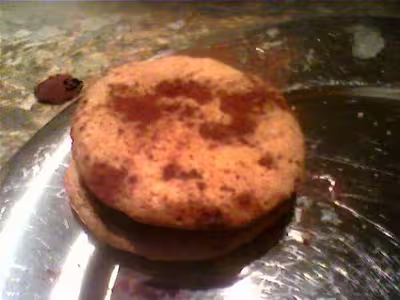 Macarons au chocolat au lait passion de Hermé