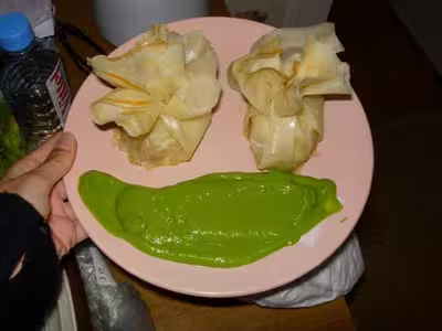 Aumonières de Saint-Jacques et coulis de courgettes