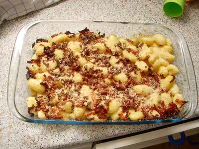 Gratin de gnocchis aux lardons sauce aux champignons