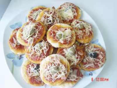 Minis pizzas apéritives par oumhind