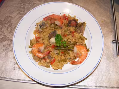 Portugal: Cataplana au riz, crevettes et à l’ail