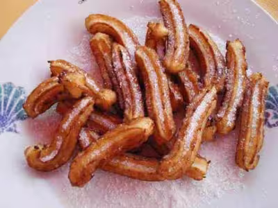 Chichis ou churros à la cannelle et au rhum