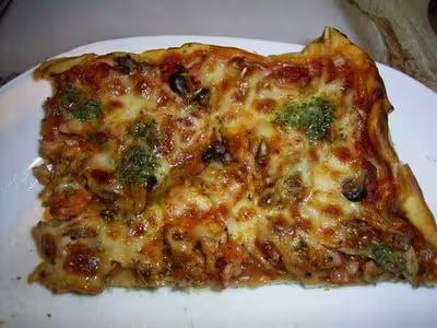 Pizza aux fruits de mer et sa persillade