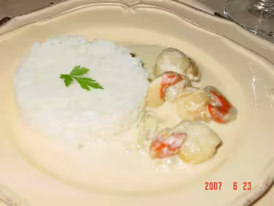 Fricassée de crevettes et  St Jacques à la crème
