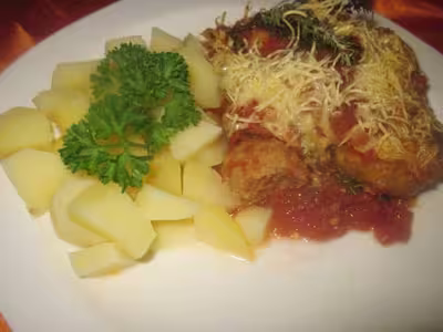 Boulettes de boeuf sauce tomates gratinées