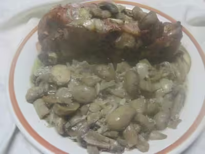 Côte d'échine de porc rôti.aux champignons