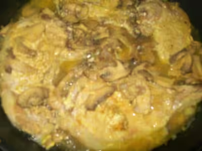 Côtelettes de porc aux champignons sauce curry