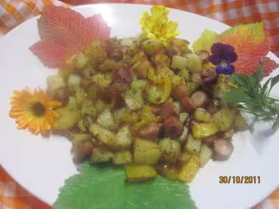 Poêlée de pommes de terre, poivrons et saucisses
