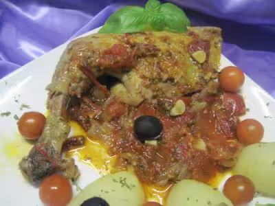 Cuisses de pintade aux tomates, ail et persil