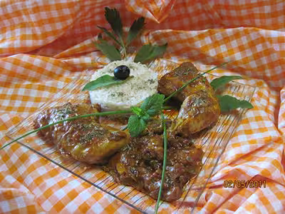 Cuisses de poulet en sauce tomates