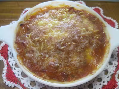 Endives au jambon gratinées ,sauce tomate