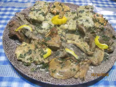 Filets de colin aux champignons,beurre persillade